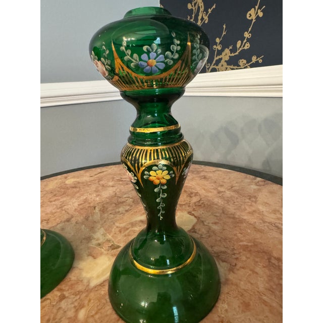 Hollywood Regency Pair of Vintage Bohemian Emerald Green Hand-Painted Glass Candlesticks With Gilt Floral Motif For Sale - Image 3 of 3