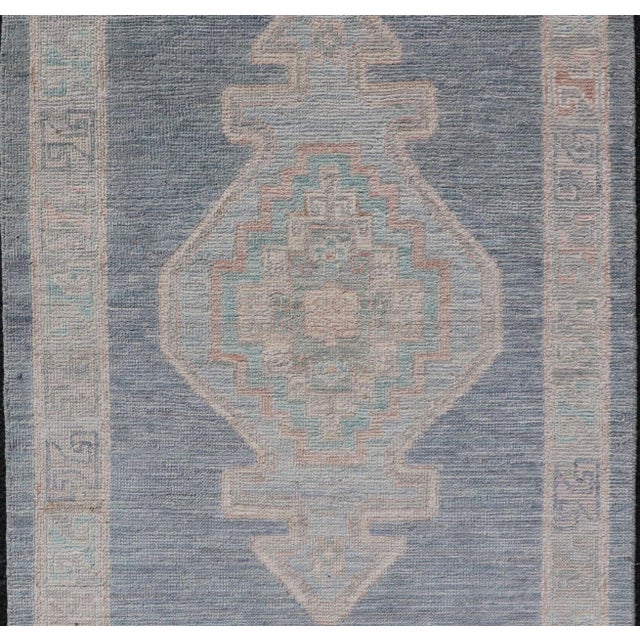 Measures: 2'7 x 3'11 Medallion Designed Modern Oushak with Blue Background and Cream Border. Keivan Woven Arts; rug...