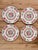 An exquisite set of four vintage Chinese porcelain dinner plates featuring the timeless Rose Canton pattern, richly hand-...