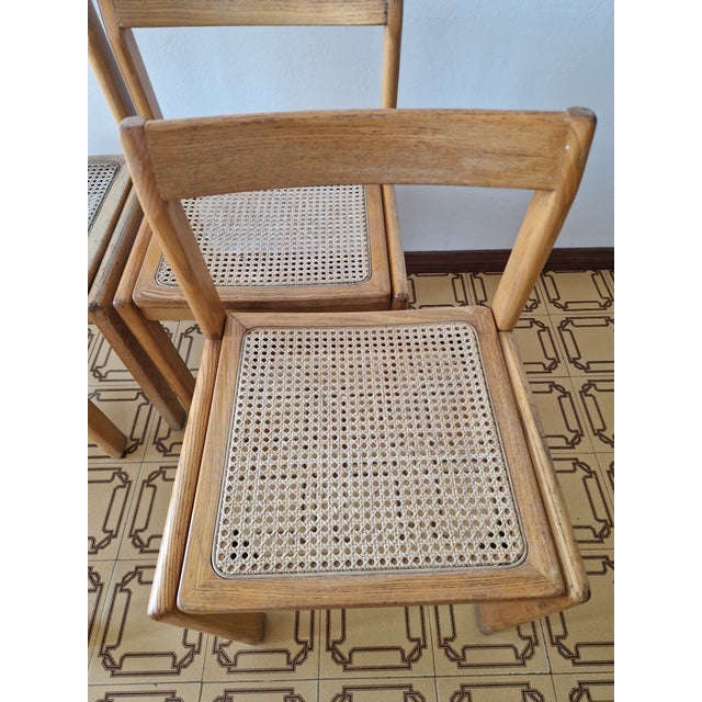 Set of 4 Vintage 1970s Wood and Cane Chairs Stunning set of 4 vintage dining chairs dating back to the 1970s, an...
