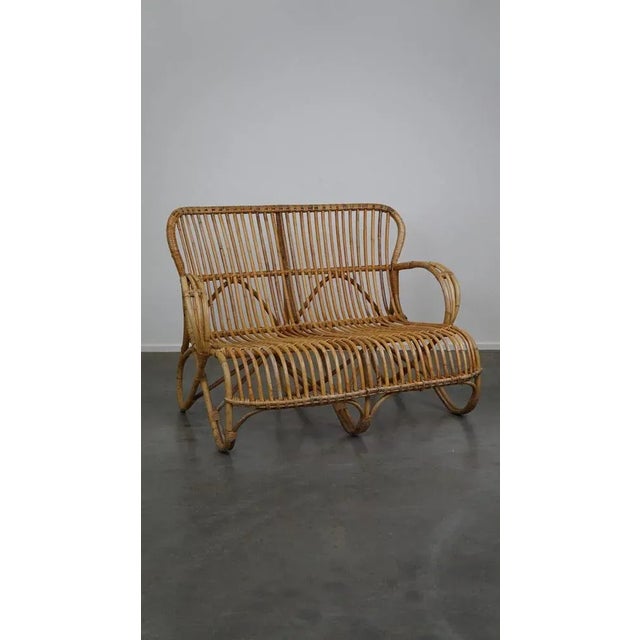 This beautifully designed Dutch Design 2 Ziss Bank made in the 1950s "in the Netherlands. This rattan Belse 8, 2 -seater...