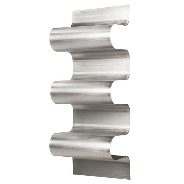 Wave bookshelf in powder coated aluminium by julien vidame. Dimensions: w 50 x d 35 x h 135 cm. Materials: powder-coated...