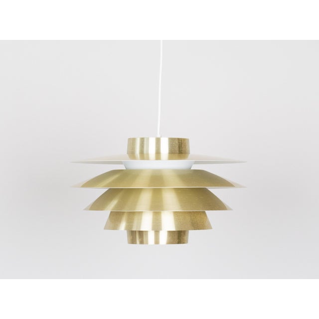 The lamp was designed by Svend Middelboe in 1962 and manufactured by Nordisk Solar. It is a jewel of not only Danish but...