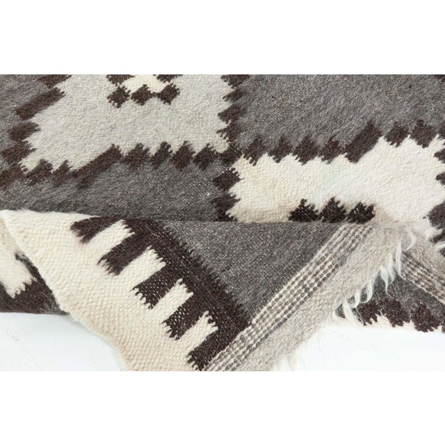 European folk stamverband goat hair rug by Doris Leslie Blau Size: 4'10" × 6'2" (147 × 187 cm) Inspired by the works of...