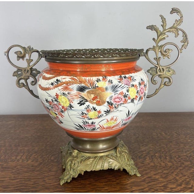 This elegant Vintage French porcelain vase is a richly decorative urn-form piece, offered in Good condition, featuring a...