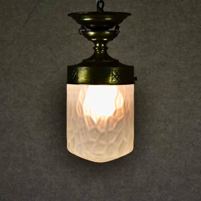 Art Nouveau Ceiling Lamp in brass and original shade in crocodile-patterned glass. Up to 250V (Europe/UK Standard).The...