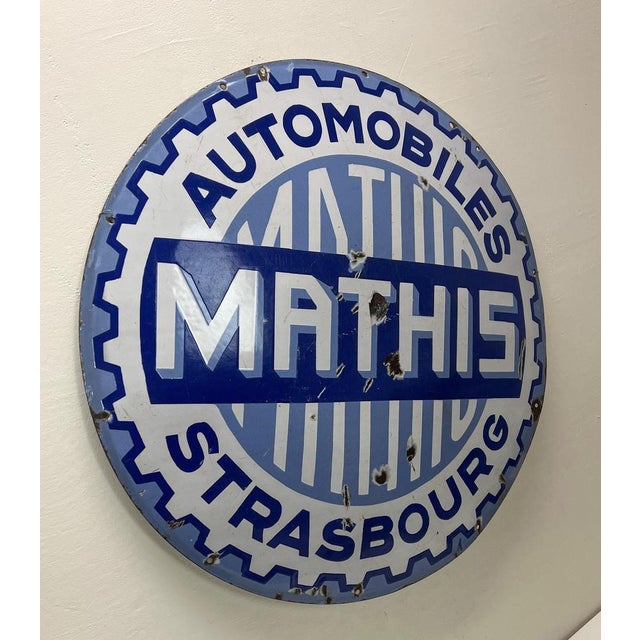 Antique French Round Enamel Sign Automobiles Mathis. The letters and logo are in relief, the sign has a beautiful old...