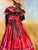 A one-of-a-kind pastel drawing of a woman in a vintage-style crimson gown, seen from behind. She wears a wide-brimmed...