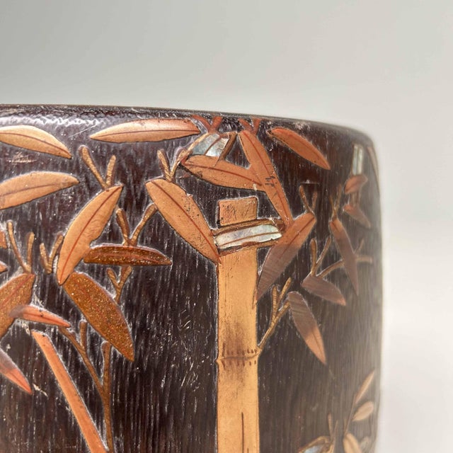 An antique Japanese Kiri Hibachi, a traditional fire bowl crafted from paulownia wood, originating from the late Meiji...