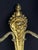 Elegant late-19th-century French Louis XVI-style gilt bronze wall sconce featuring finely cast neoclassical ornamentation....