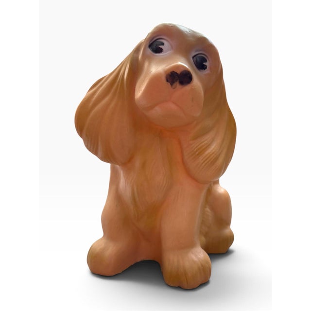Charming vintage molded plastic dog night light with a wonderfully aged, warm honey-brown coloration. The seated spaniel-...