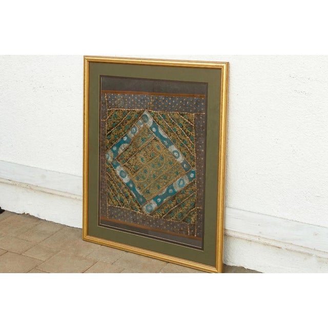 This is a masterful display of Zardozi, the ancient art of gold sewing. This antique textile fragment features a complex...