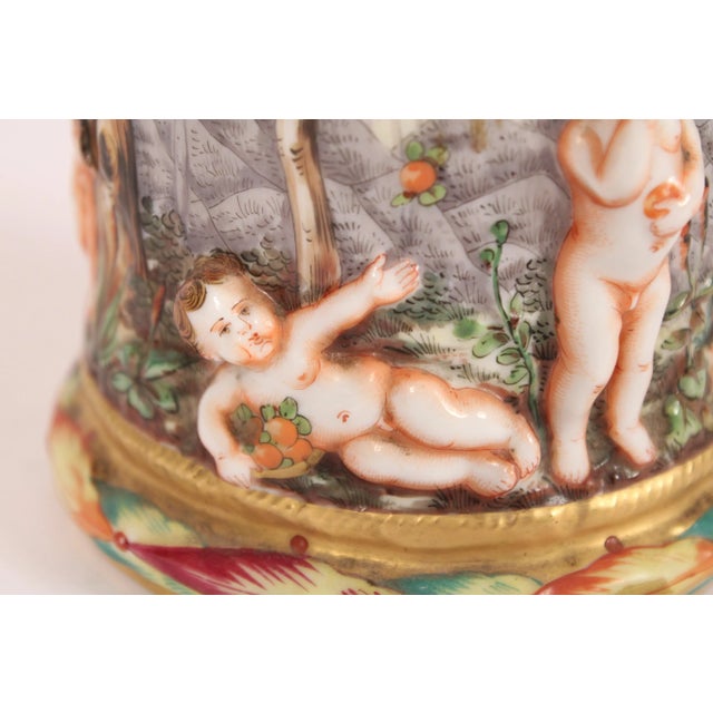 Capodimonte porcelain covered cylindrical vase, made in Italy, circa 1930's. With a removeable top a cylindrical body with...