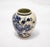 An exquisite late 19th century Dutch Delftware vase, hand-painted in luminous Delft Blue and signed by the artist....