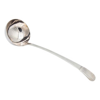 Silver Soup Ladle with Reliefs on the Handle For Sale