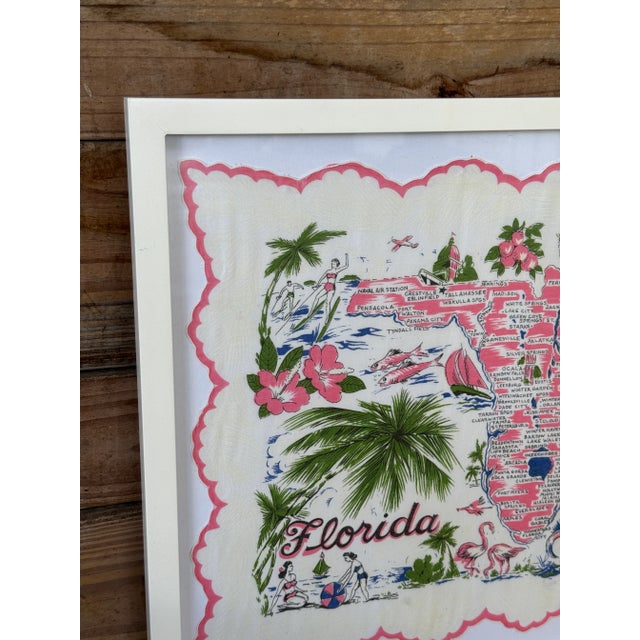 A cheerful slice of Old Florida charm, this vintage Florida souvenir handkerchief has been professionally mounted and...