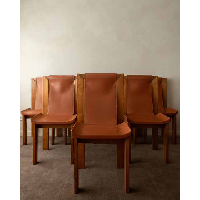 A vintage french brutalist dining chair set in solid elm and cognac leather, attributed to giovanni luigi gorgoni for...