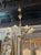 Modern Murano gold glass 8-arm chandelier. The chandelier has been professionally rewired, comes with matching chain and...