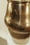 A timeless vintage hammered brass table lamp with a soft pleated linen shade. The handcrafted brass base features gentle...