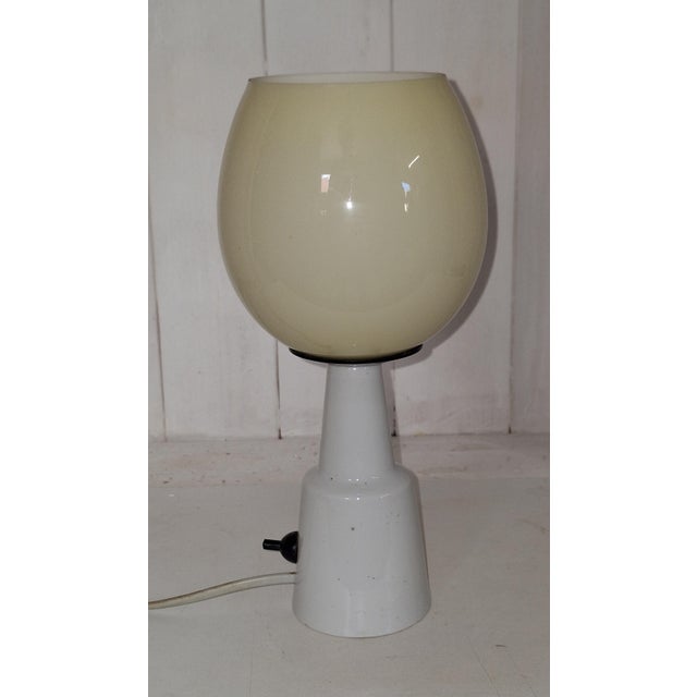 Mid-Century German White Porcelain Table Lamp with Cream Glass Shade from EVP, 1950s, in Very Good conditions. Designed...