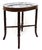 A vintage Chinoiserie style tray top table. This removable, oval top table with willow ceramic platter sits in a mahogany...