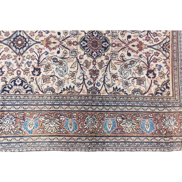 ?This antique Persian Meshad rug, dating back to circa 1900, is a distinguished piece from Doris Leslie Blau, renowned for...