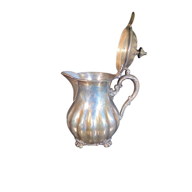Item: Silver-plated Footed Creamer Style: English Traditional, Traditional Brand: Pairpoint Silver Company Country of...