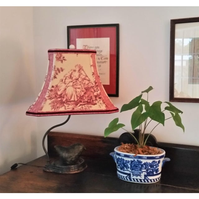 Fabric and Trim "PASTOURELLE" A Schumacher table print. Linen fabric. Medium weight. Brown and deep red. The cut corners...