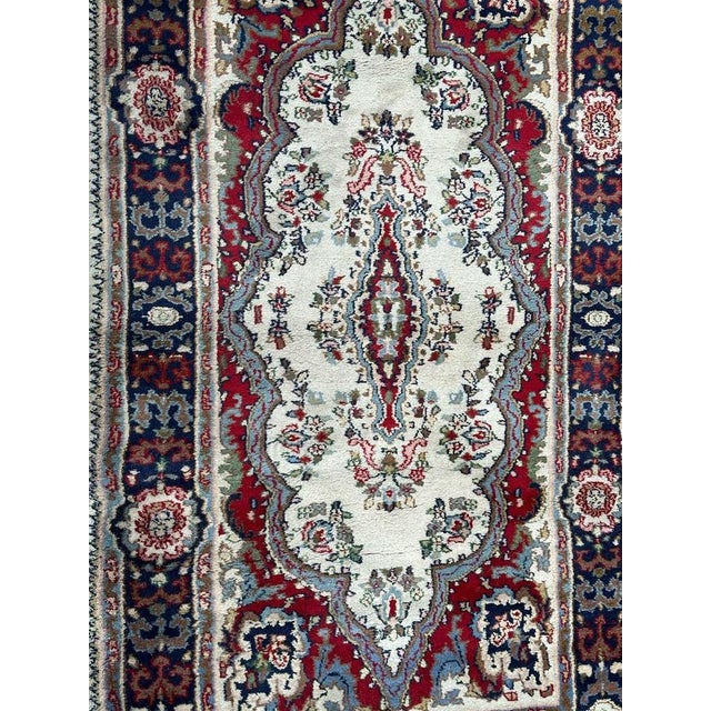Nice mid century kirman rug with beautiful floral design with a central medallion, and nice colours with a white and red...