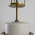 Art Deco glamor meets Industrial simplicity in this vintage brass pendant lamp. Made in Czechia in the 1970s, the wide,...