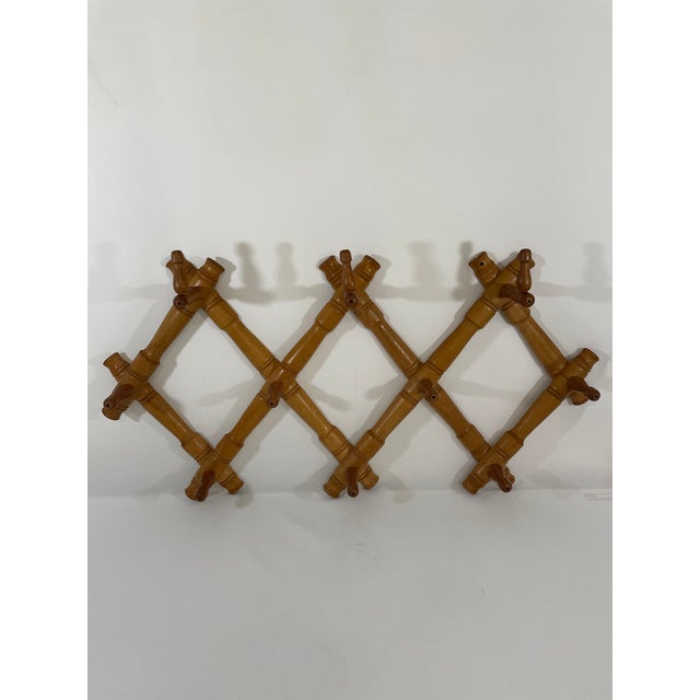 A beautiful French style Faux Bamboo wooden hand turned coat and hat rack from the 1950s. "Made in Bulgaria" stamped on...