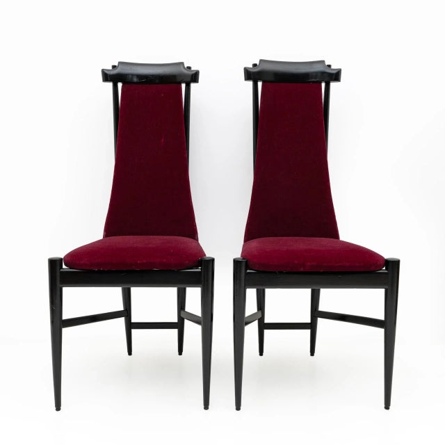 Pair of modernist chairs by the pioneer of Carioca design Sérgio Rodrigues, in ebonized beech wood covered in velvet. The...
