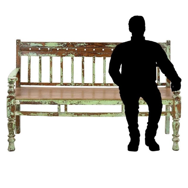 Vintage Brown Teak Bench, in Good conditions. This piece is designed in the style of the selected designer and/or...