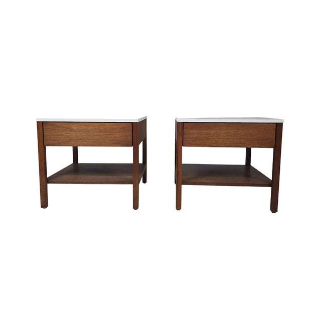Walnut bedside tables, Model 327 IS, designed by Florence Knoll in 1956. This particular example dates to the 1960s and...