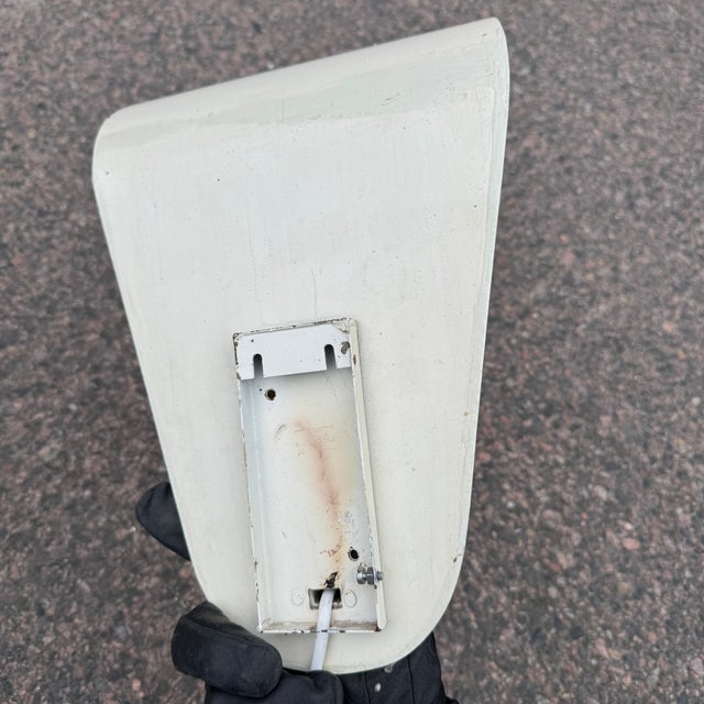 These elegant wall lamps, designed by Harald Notini for Böhlmarks, embody the refined simplicity and warmth of mid-20th-...