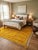 Mustard Moroccan Rug – Handmade Textured Berber Wool Rug This striking handmade Moroccan rug features a rich mustard...