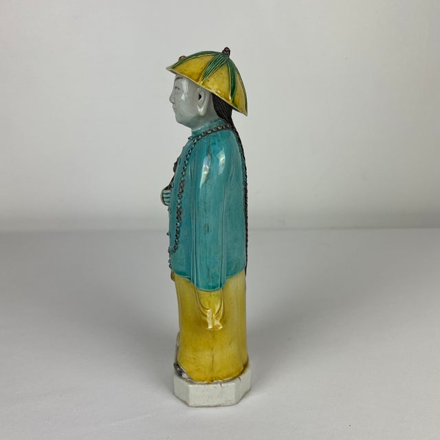 Very special late 19th century porcelain Chinese figure of a man wearing a summer hat. Extremely fine porcelain that is...