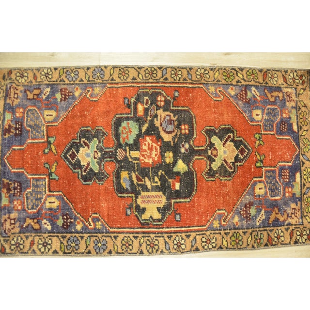 This is a vintage Turkish Oushak rug from the 1960s. The piece was hand-knotted.