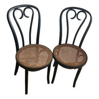 Pair of Mid 20th Century Black Bentwood Cafe Chairs With Cane Seats For Sale