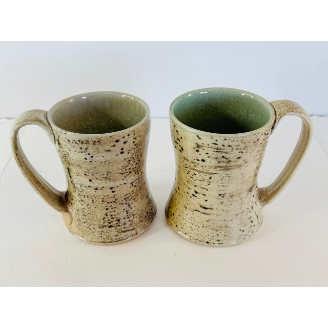 1990s Art Studio Pottery Brown Speckled Handled Mugs, a Pair. Hand crafted pottery mugs, with nice big handles. Green...
