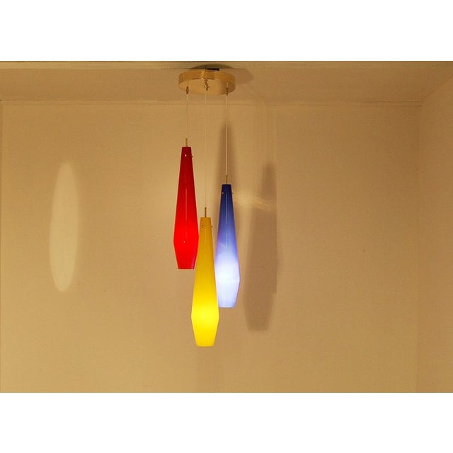 Beautiful Italian brass chandelier Stilnovo style. 3 globes (height 28 in) with 3 bulbs up to 100W each, E14 socket bulbs....