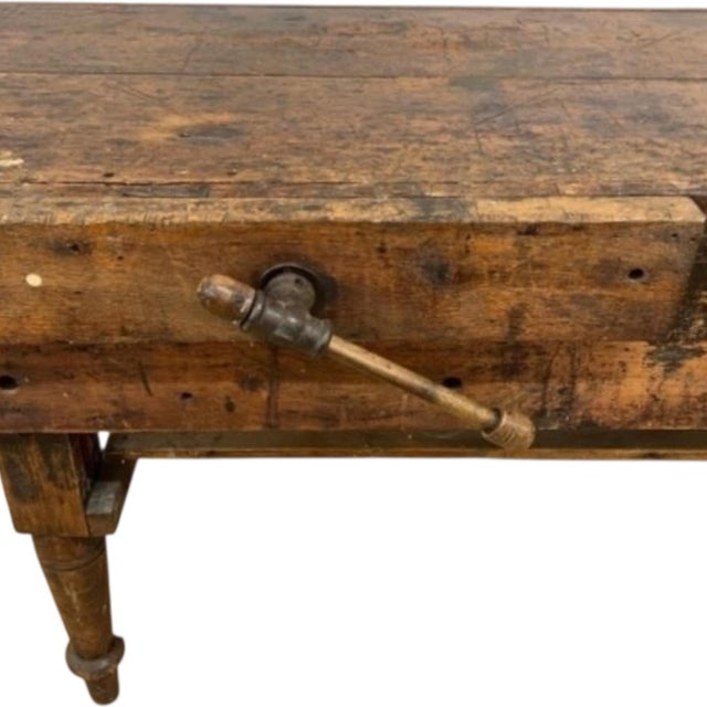 Exceptional 10-foot solid-wood cabinetmaker’s workbench retaining its substantial original work surface, traditional screw...