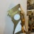 Plastic 1980s Modernist Brass and White Plexiglass Tribal Mask Wall Light For Sale - Image 7 of 12
