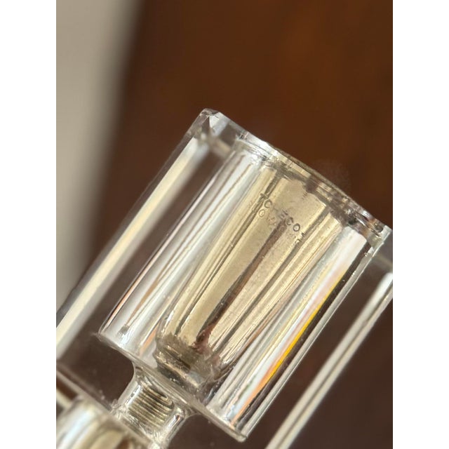 This exquisite pair of glass candle holders, marked "Tchécoslovaquie," showcases the renowned craftsmanship of mid-century...