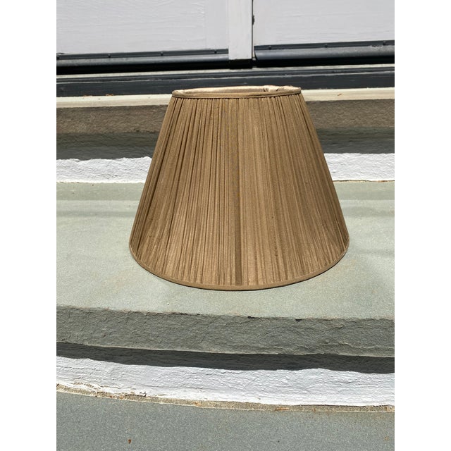 Elegant shirred silk lampshade with drum profile.