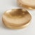 This pair of handcrafted bowls has organic round silhouettes, and an ultrathick profile. With a warmGold finish and subtle...