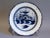 A circa 1790, English pearl ware wall plate with a fluted feathered edge surrounding a Chinese pagoda and garden. It is...