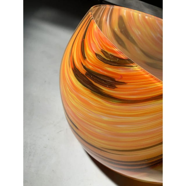 Artistic vase in murano glass with colored reeds in shades of yellow, amber and red. Geometric design in very particular...