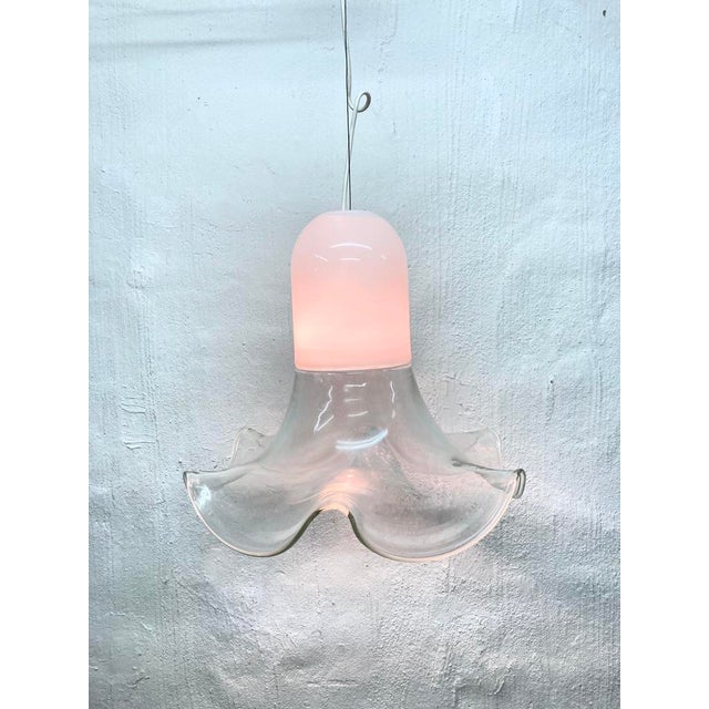 One pendant lamp from the 1970s/80s, single-bulb, E27 socket. The design is attributed to Renato Toso & Roberto Pamio for...