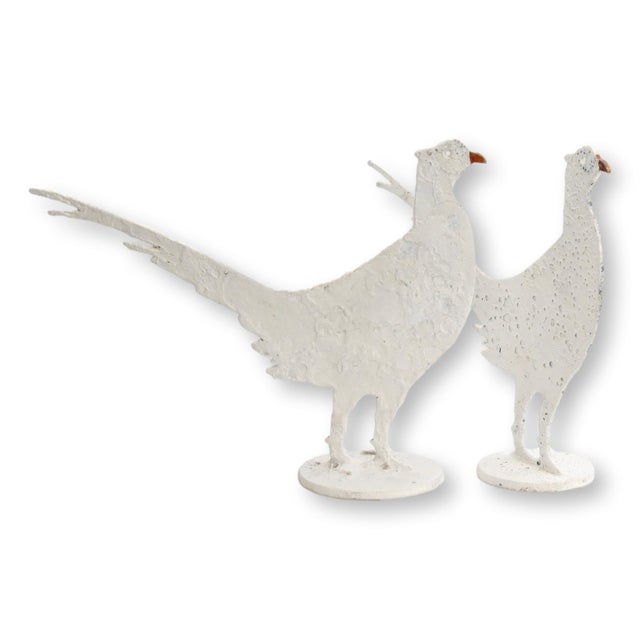 Pair of metal pheasant ornaments on a base. Handcrafted in England from reclaimed antique materials. White powder-coated...